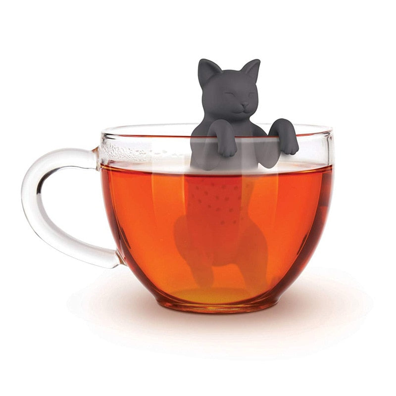 cat tea infuser in a cup of tea