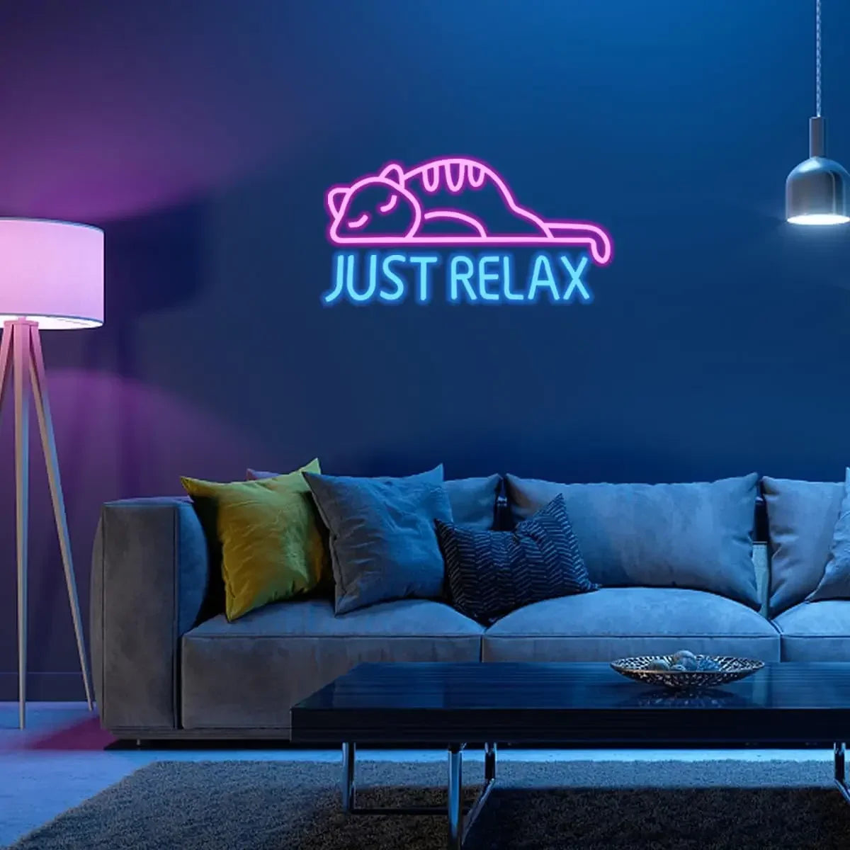 Purr-fect Snooze Neon Sign featuring a snoozing cat design and 'Just Relax' text, illuminating a stylish living room setup.