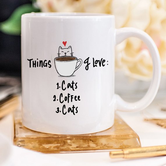 funny coffee mug about loving coffee and cats 